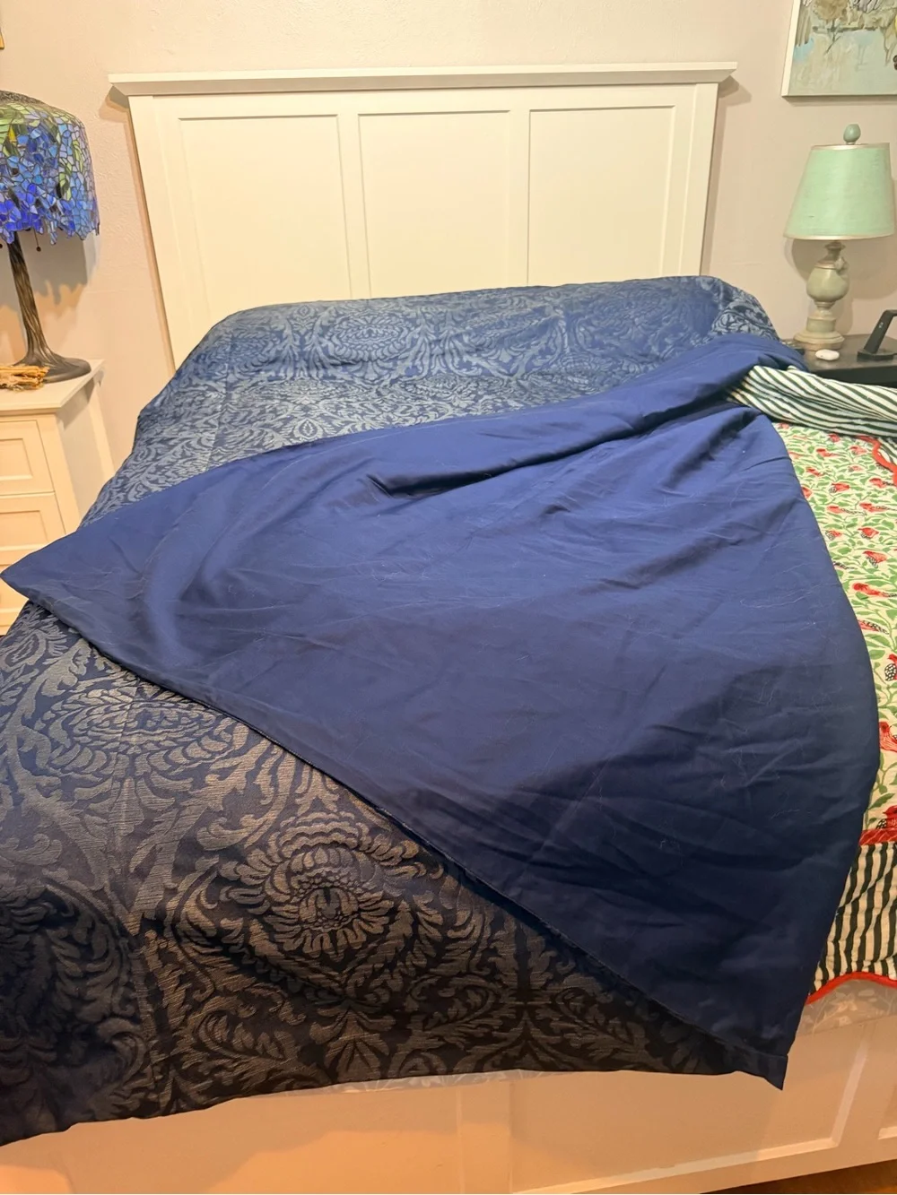 Deep blue jacquard duvet with damask pattern
